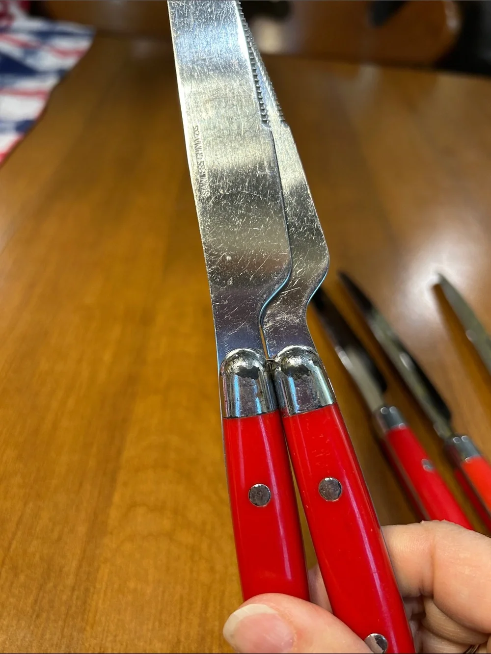 Set of 7 Red Handle Dinner Knives